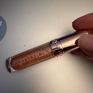 Anastasia Beverly Hills Amber Sparkle Gloss with Orange Box